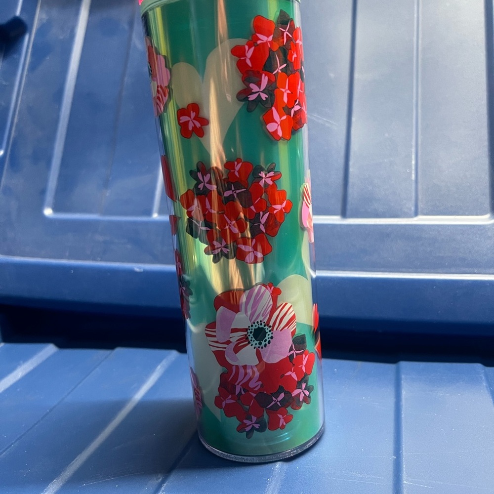 Floral Patterned Starbucks. For use with cold drinks only. Does have a flaw.
